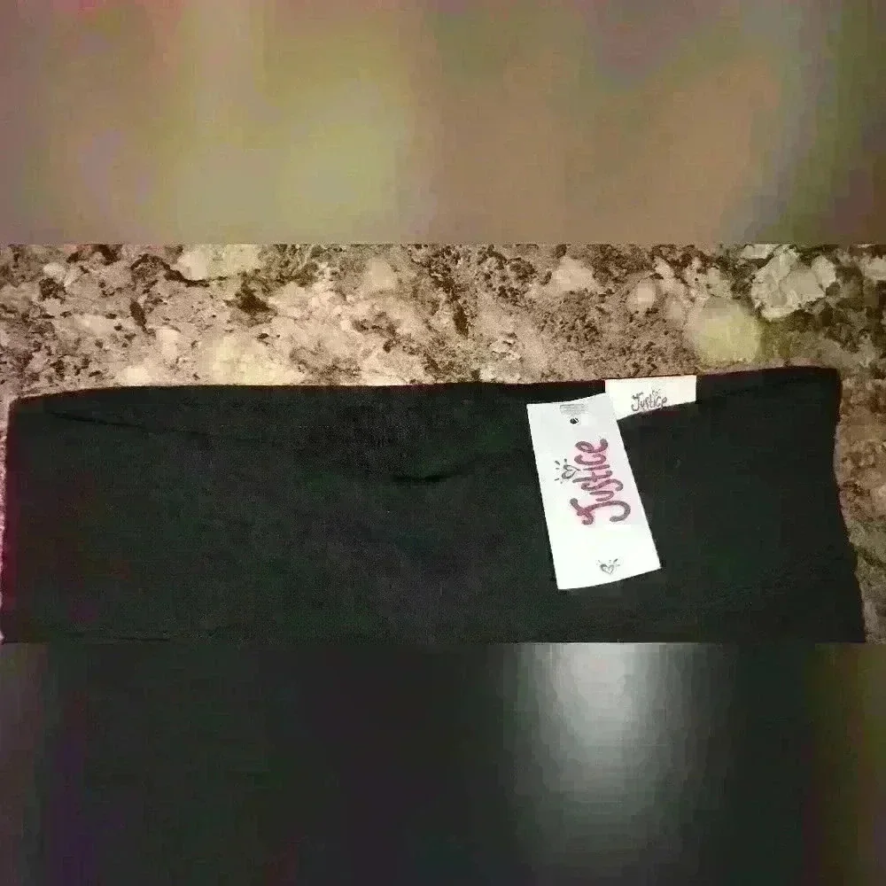 Justice full-length girls black leggings. Size 12 new with tags